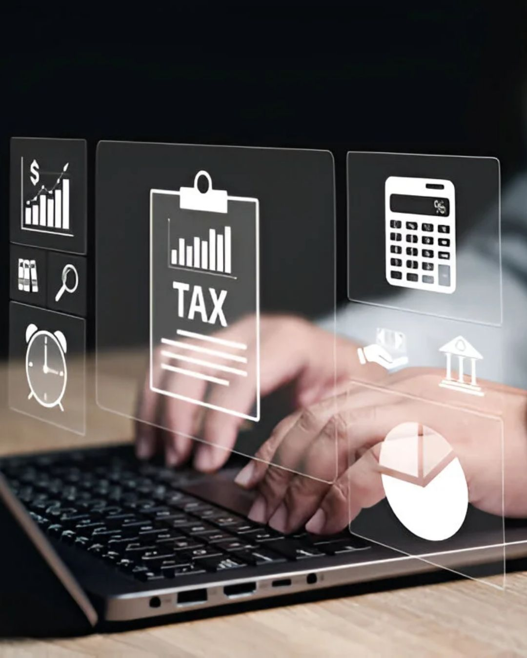 Financial reports and tax information displayed on a laptop
